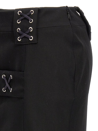Skirt by Alessandra Rich for women in wool black showcases a sultry silhouette, elegantly defined by its midi and the sophisticated sultry design of the Women's Wool Midi Skirt.