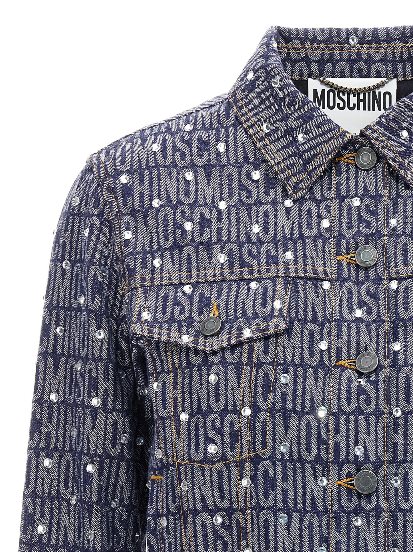 Trucker Jacket by Moschino for women in polyester denim cotton & rhinestone blue & patterned features an on trend silhouette, showcasing refined pockets and a sophisticated for a truly on trend finish.