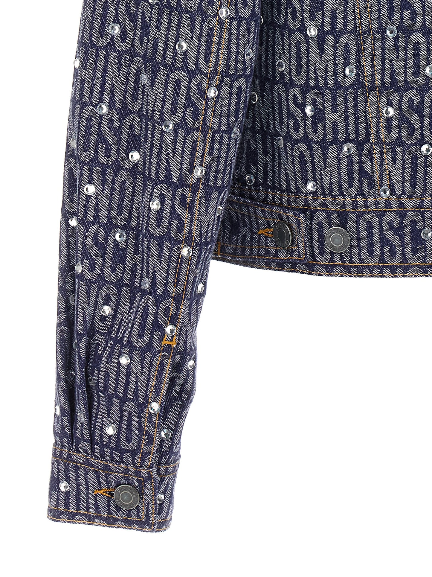 Trucker Jacket by Moschino for women in polyester denim cotton & rhinestone blue & patterned features a dramatic silhouette, showcasing a sophisticated and distinctive pockets for a dramatic aesthetic.