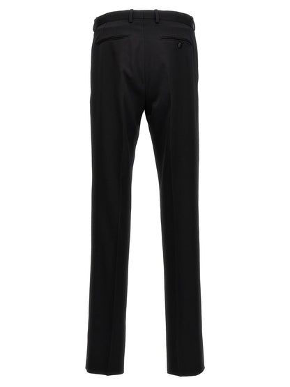 Trousers by Lanvin for men in satin wool black features a tailored silhouette with a tailored , defined by its long and a sophisticated .