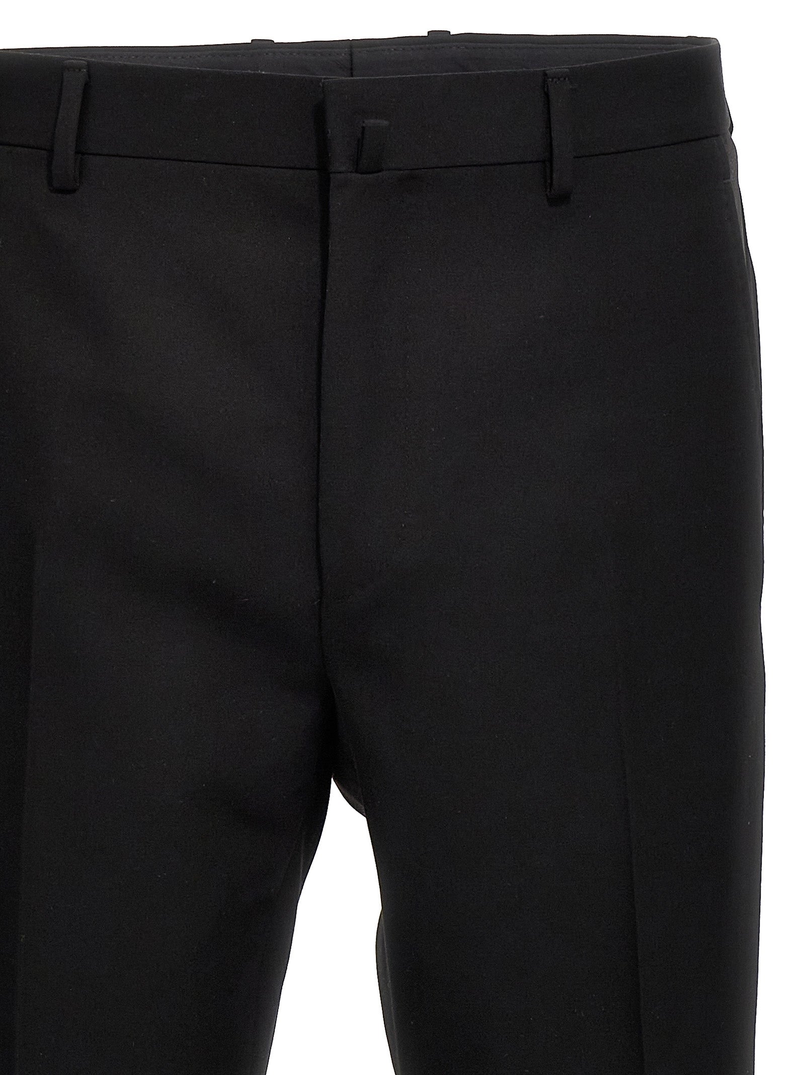 Trousers by Lanvin for men in satin wool black presents a perennial silhouette, meticulously tailored with a cut, long finish, and an elegant .