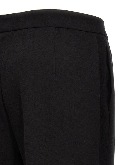 Chinos Pants by Moschino for women in viscose wool crepe black features an perennial wide and long, expertly tailored with a perennial for a refined silhouette.