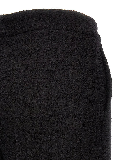 Chinos Pants by Moschino for women in polyamide wool black features an utilitarian-chic silhouette, showcasing a utilitarian-chic cropped with a cropped cut and for a refined look.