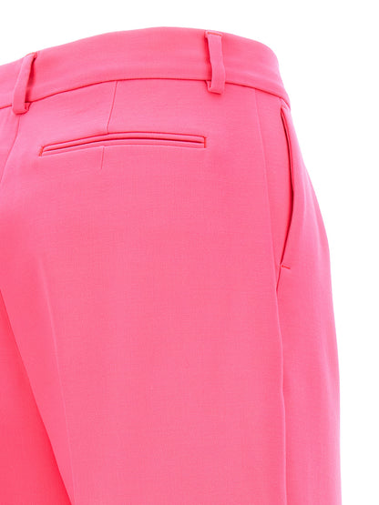 Casual Pants by Sportmax for women in virgin wool fuchsia features a polished silhouette with a polished wide, reaching a polished long and finished with a polished .