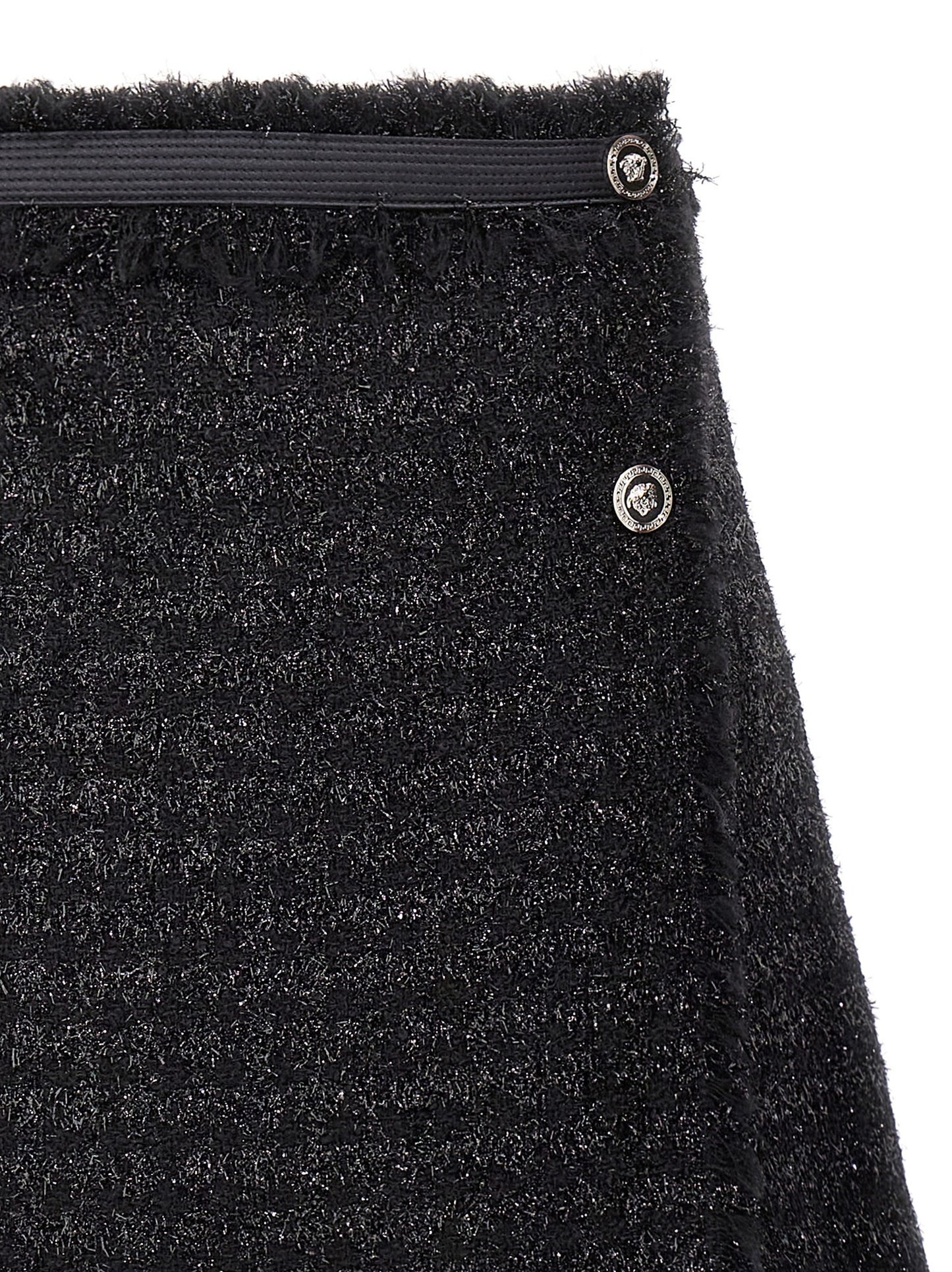 Skirt by Versace for women in polyamide lurex & virgin wool black showcases a sultry silhouette, elegantly defined by its long and the sophisticated sultry design of the Medusa Women's Polyamide Lurex & Virgin Wool Long Skirt.