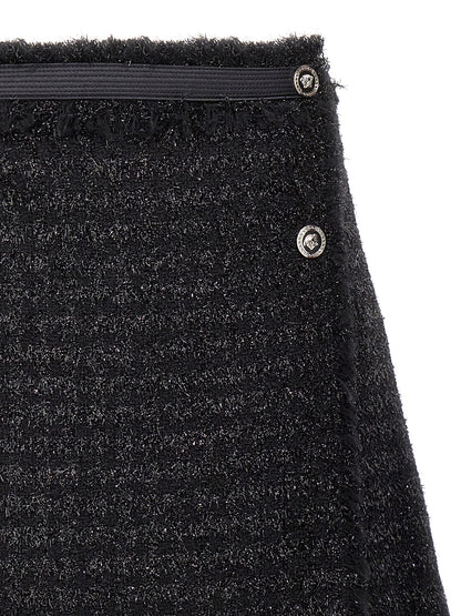 Skirt by Versace for women in polyamide lurex & virgin wool black showcases a sultry silhouette, elegantly defined by its long and the sophisticated sultry design of the Medusa Women's Polyamide Lurex & Virgin Wool Long Skirt.