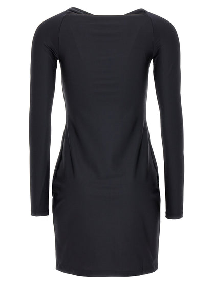 Dress by Coperni for women in stretch polyamide black features an cute silhouette, detailed with a and that elegantly flows into a cute short mini.