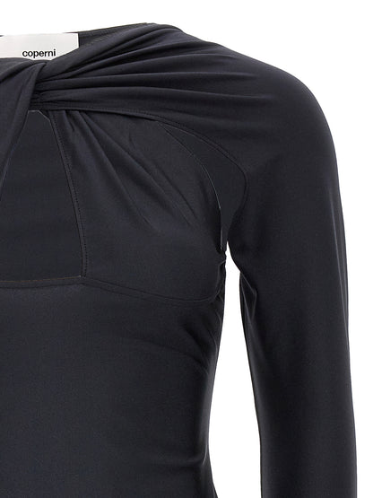 Dress by Coperni for women in stretch polyamide black features an magnificent silhouette, artfully detailed with a magnificent and that flows into an magnificent short mini.
