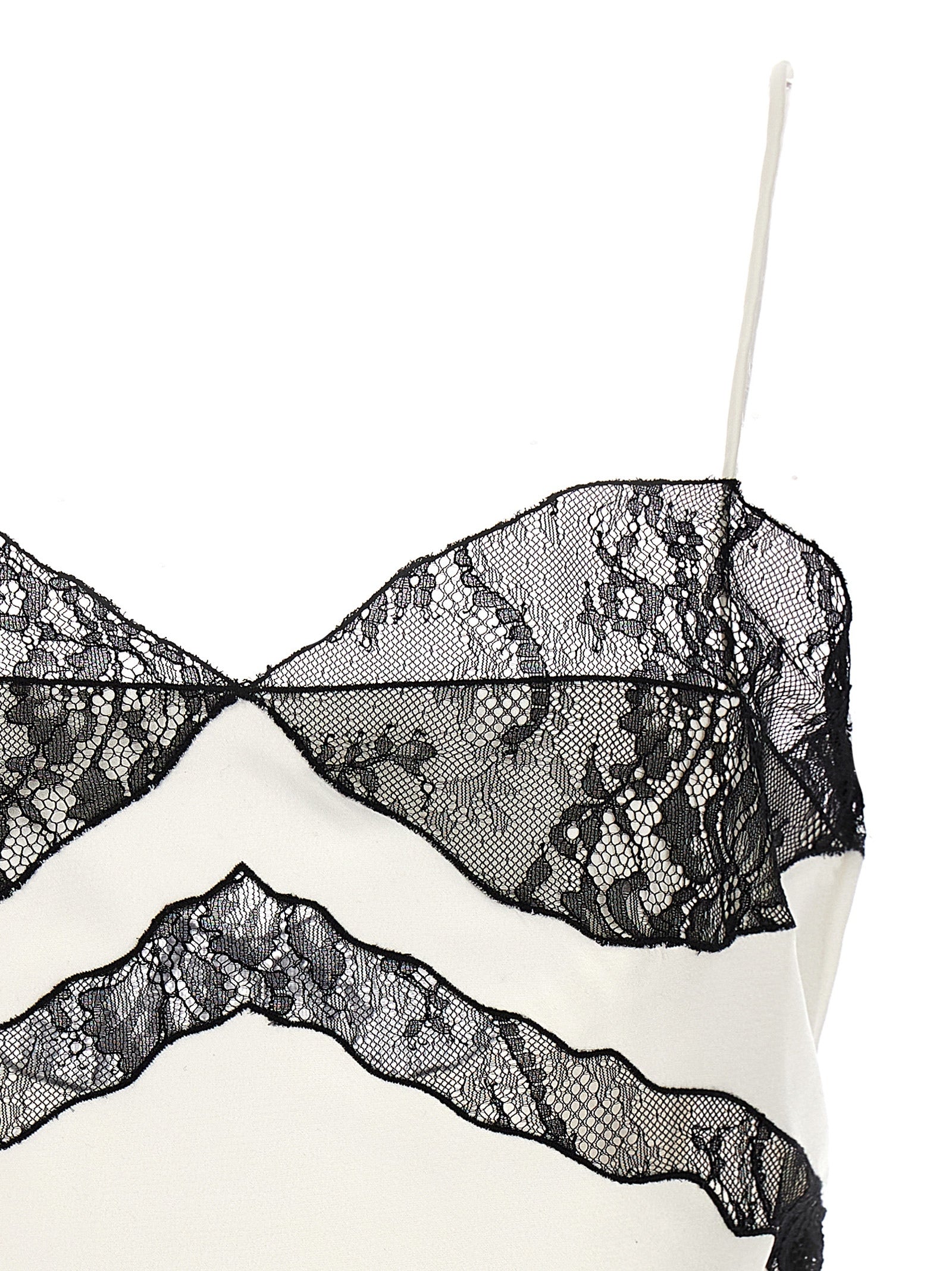 Blouse by The Andamane for women in polyester satin bicolour, black & white showcases a sleek silhouette, elegantly detailed with a sleek and for a sleek finish.