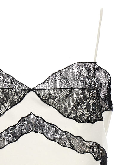 Blouse by The Andamane for women in polyester satin bicolour, black & white showcases a sleek silhouette, elegantly detailed with a sleek and for a sleek finish.