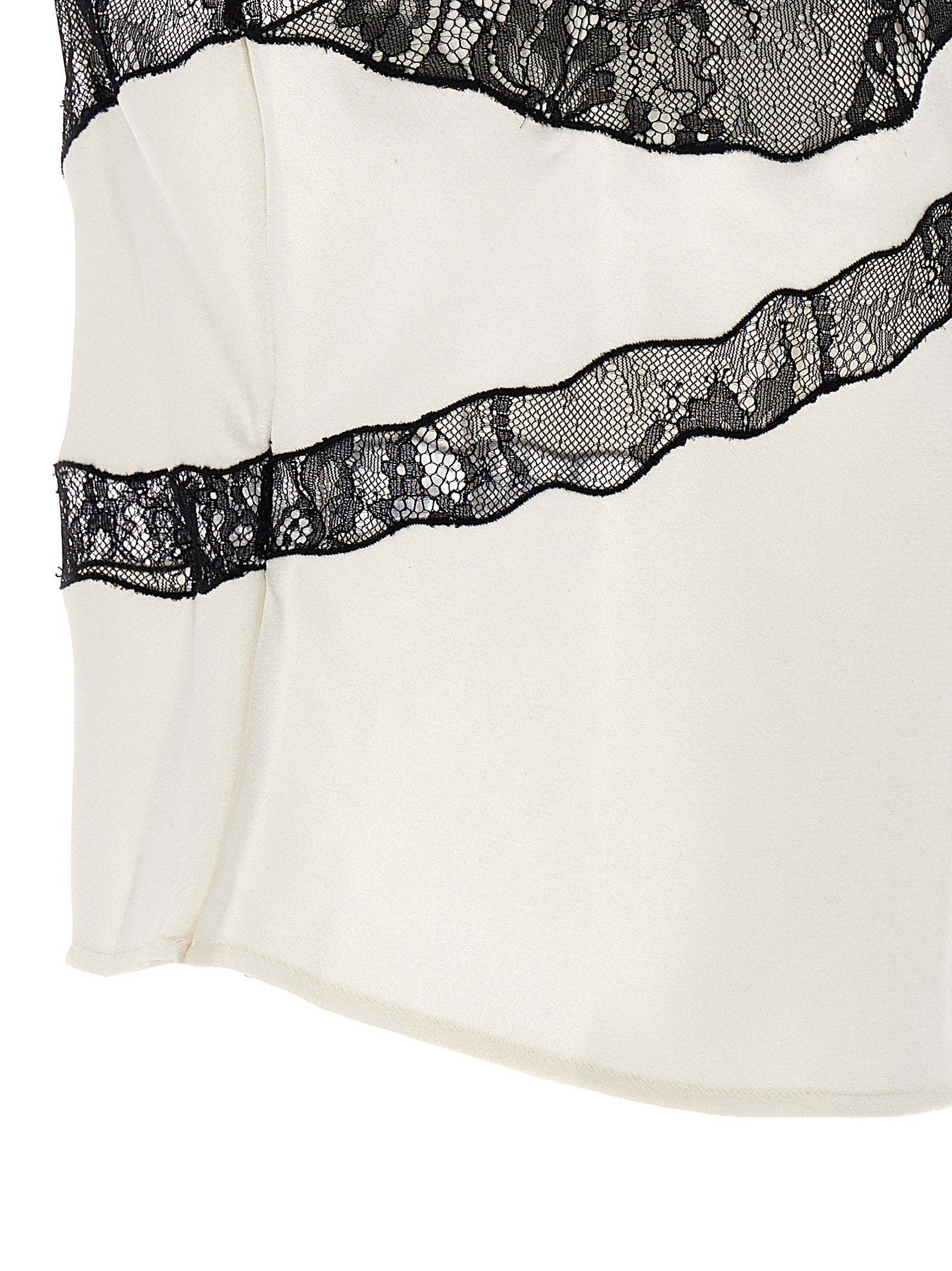 Blouse by The Andamane for women in polyester satin bicolour, black & white showcases a sharp silhouette, elegantly detailed with a sharp and sharp .