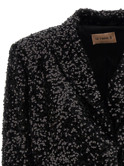 This Blazer by LE TWINS for women in polyester & sequins black presents a tailored silhouette, meticulously tailored with a tailored and distinctive for a tailored finish.