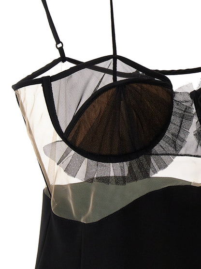 Dress by Nensi Dojaka for women in stretch polyester & viscose black features an eye catching silhouette with a sophisticated , elegant , and a refined short for a eye catching aesthetic.