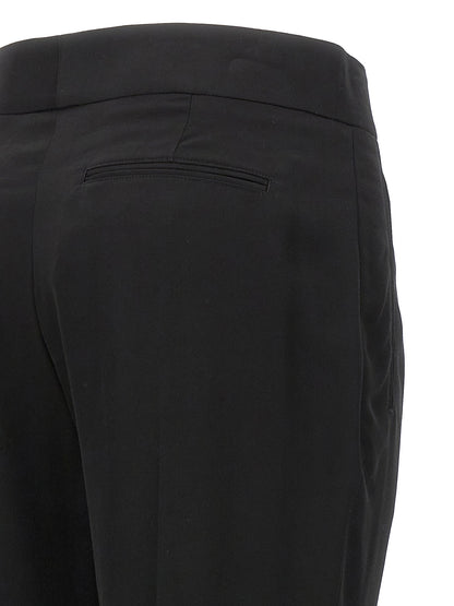 Trousers by Tom Ford for women in viscose black & gold features a artisanal silhouette, showcasing a sophisticated with a long and for a artisanal finish.