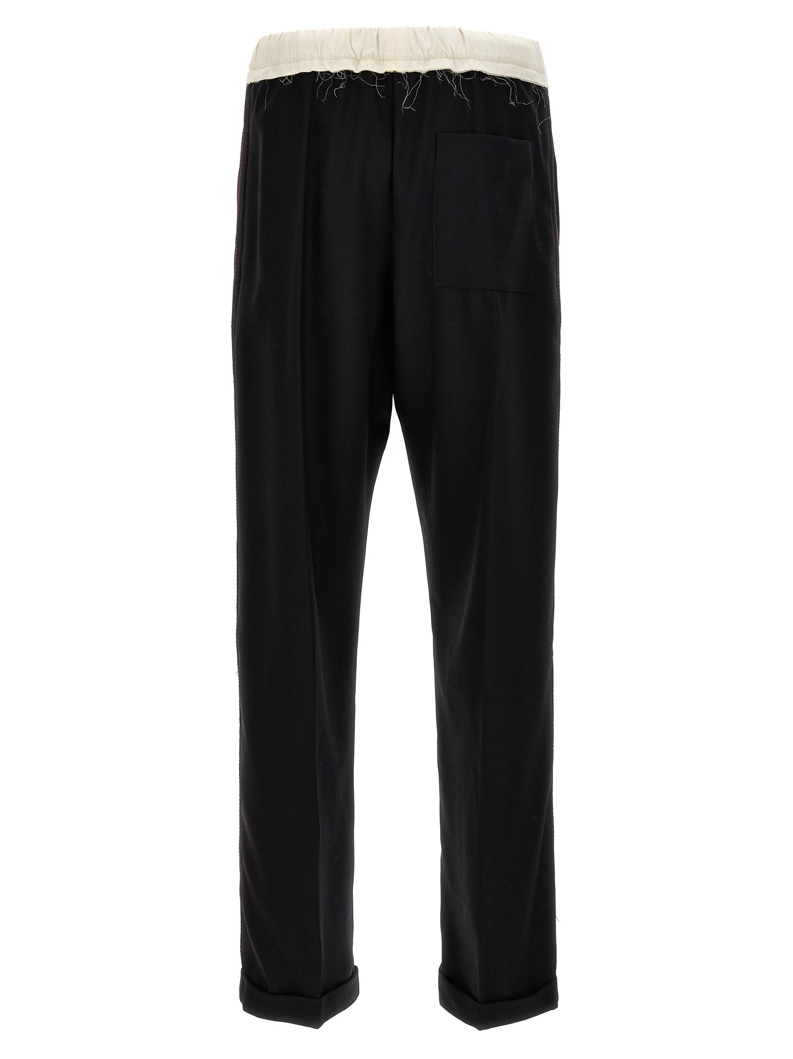 Casual Pants by WALES BONNER for men in wool bicolour, black & white features an sophisticated and with a precise long, creating a sophisticated and sophisticated silhouette.
