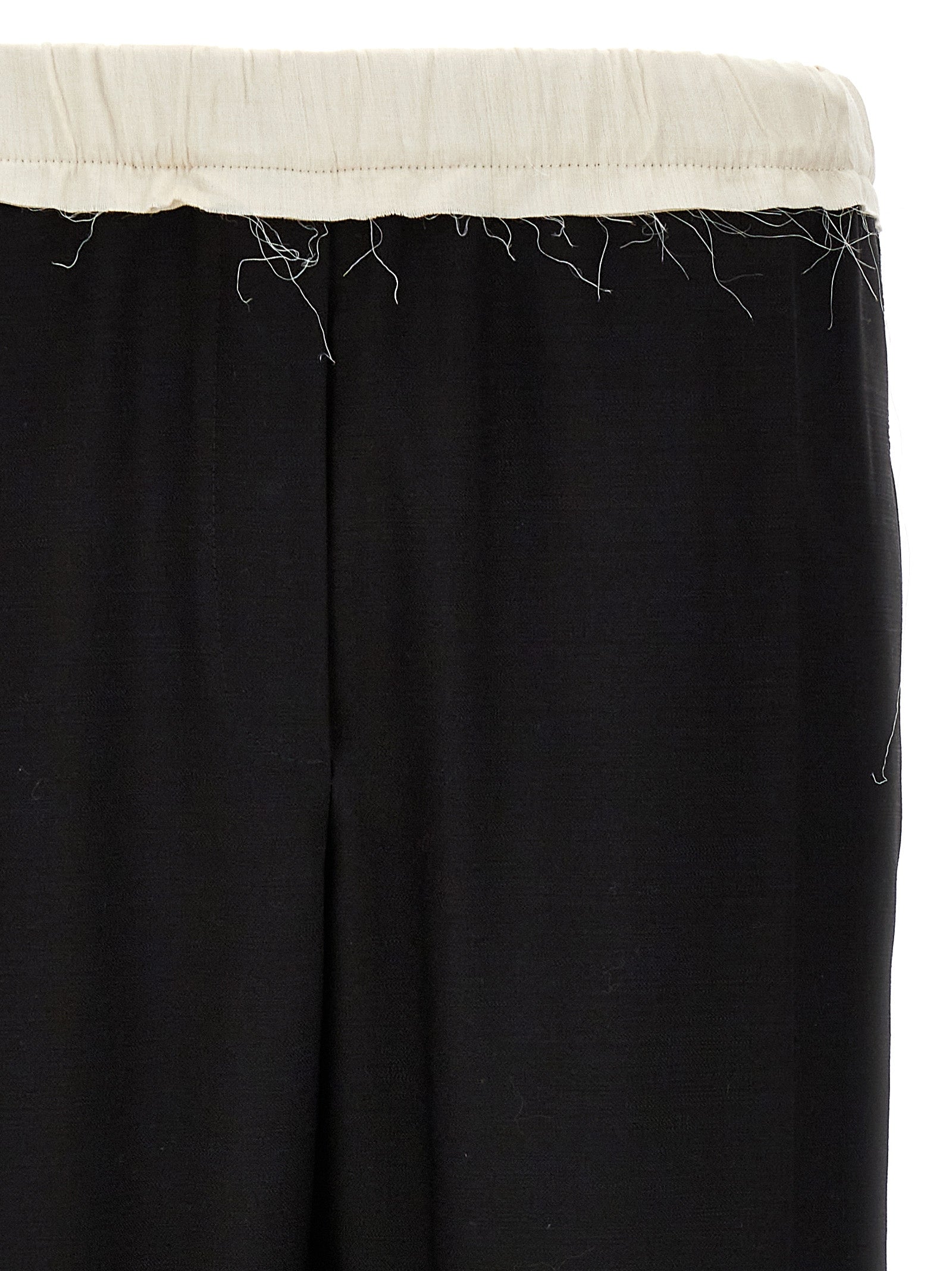 Casual Pants by WALES BONNER for men in wool bicolour, black & white presents a refined pantology silhouette, artfully defined by a refined pantology , long, and a sophisticated .