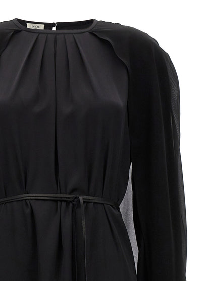 Dress by DI.LA3 PARI' for women in leather black features an eye catching silhouette with a sophisticated crew neckline, elegant , and a refined long for a eye catching aesthetic.
