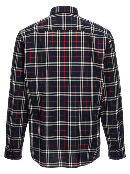 Shirt by Burberry for men in cotton blue & print showcases a sharp silhouette, elegantly detailed with a sharp and sharp .