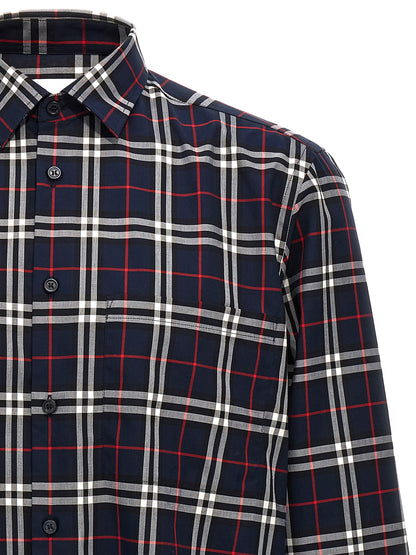 Shirt by Burberry for men in cotton blue & print presents a discerning silhouette, showcasing a sophisticated and for a truly discerning finish.