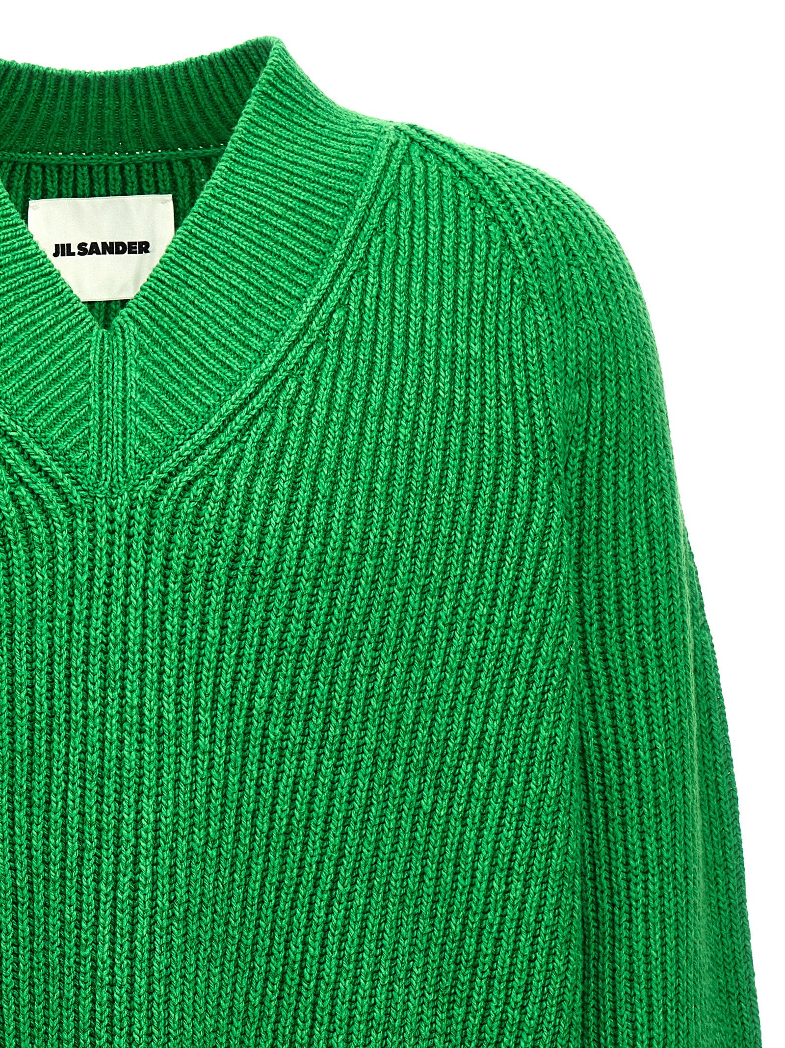 Cardigan by Jil Sander for men in wool cotton & polyamide bicolour & green features a nuanced silhouette with a refined v-neck neckline and nuanced detailing for a sophisticated look.