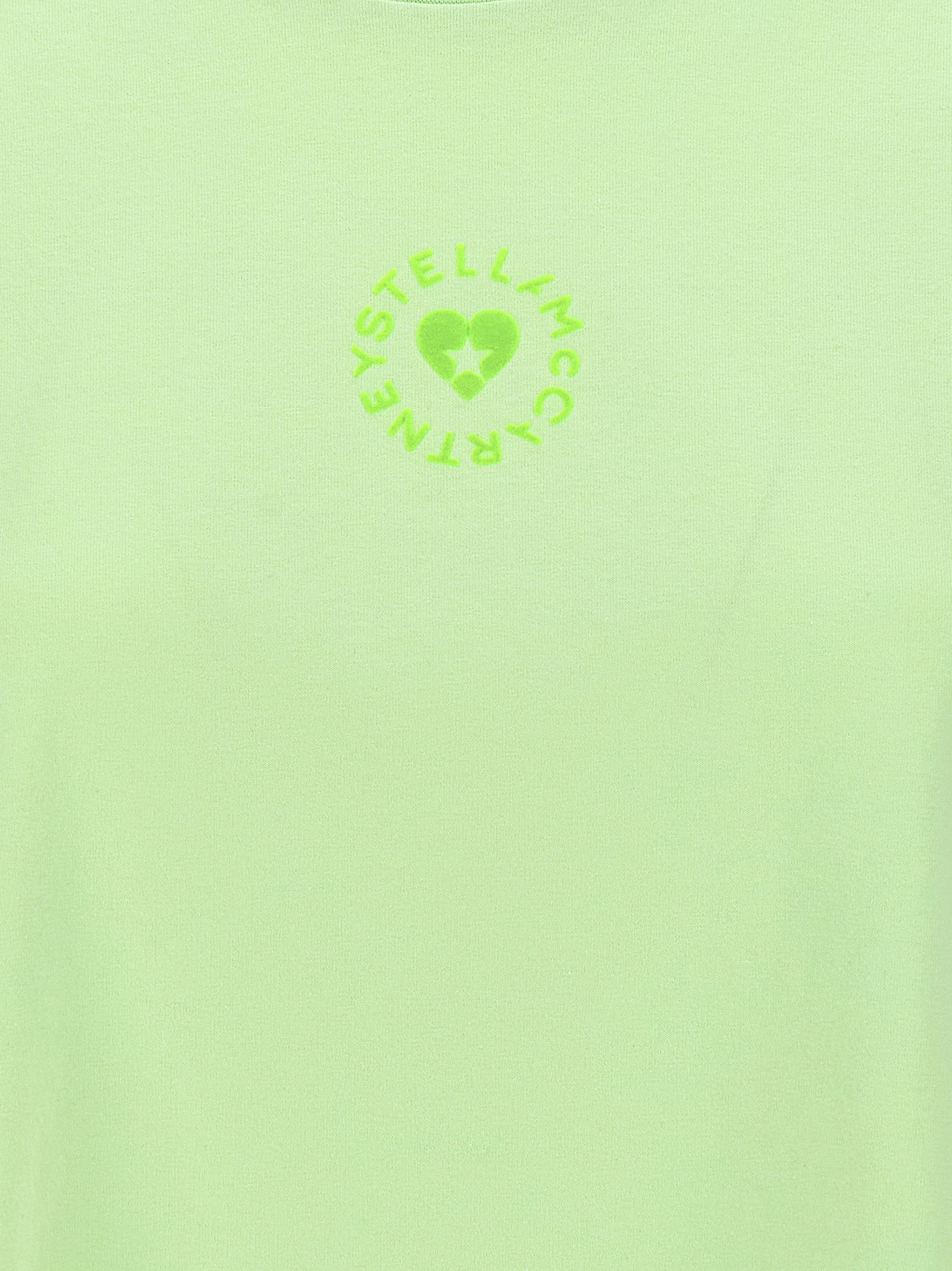 Activewear T-Shirt by Stella McCartney for women in organic cotton bicolour & green features an contemporary design with , a length, and a contemporary .
