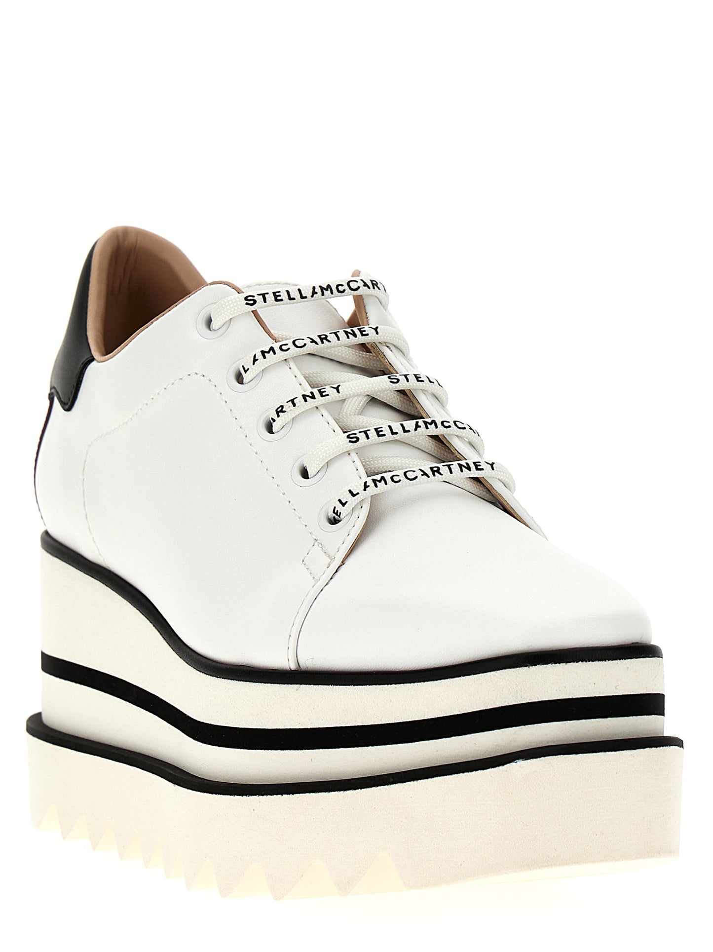 Wedge Sandals by Stella McCartney for women in polyester polyethylene & polyurethane bicolour, black & white presents a sculptural silhouette, showcasing the Women's Polyester Polyethylene & Polyurethane Wedge Sandals design with a sculptural wedge and for a premium look.