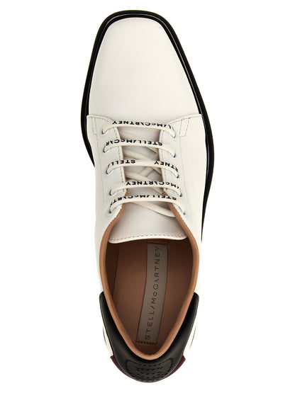 Wedge Sandals by Stella McCartney for women in polyester polyethylene & polyurethane bicolour, black & white features an exquisite silhouette, showcasing the exquisite Women's Polyester Polyethylene & Polyurethane Wedge Sandals with a wedge and .