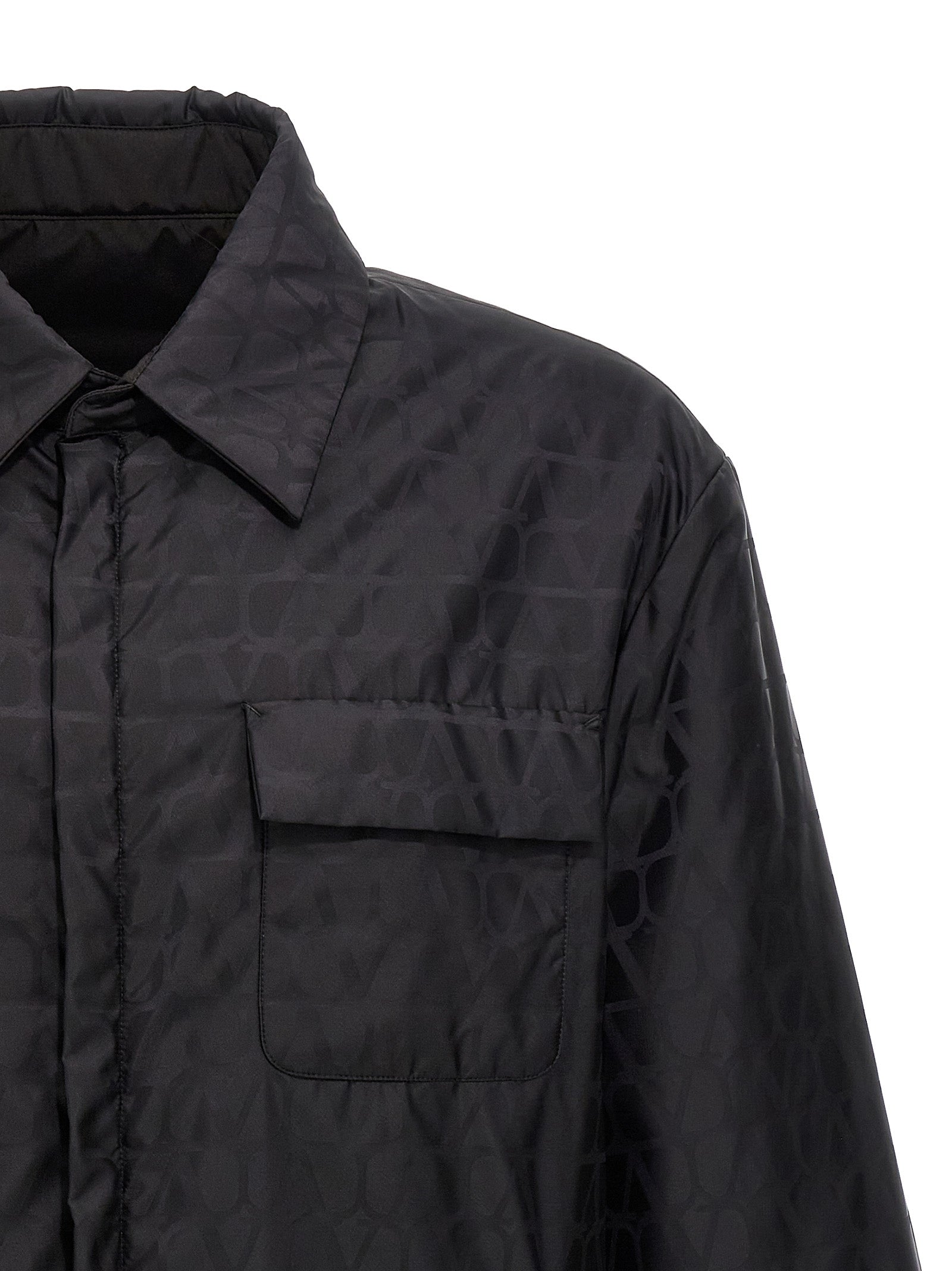 Jacket by Valentino Garavani for men in nylon black, patterned, toile & signature showcases a contemporary silhouette, detailed with a contemporary and premium pockets & insulated for a sophisticated finish.
