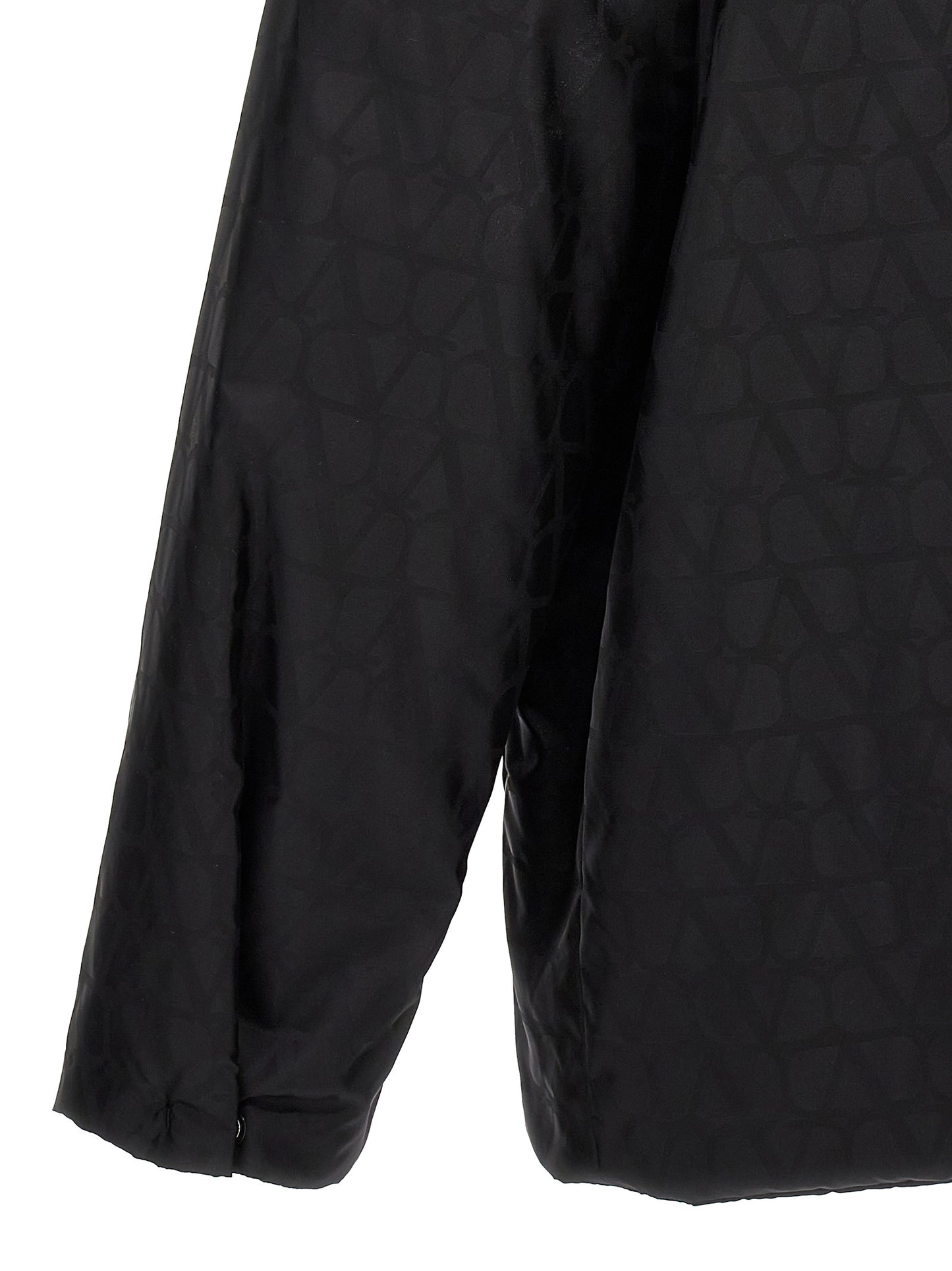 Jacket by Valentino Garavani for men in nylon black, patterned, toile & signature presents a authentic silhouette, artfully detailed with a authentic and functional pockets & insulated for a premium authentic finish.