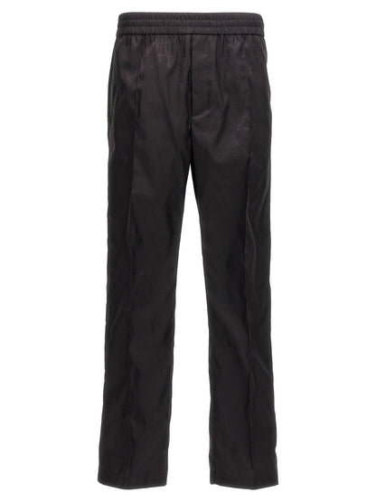 Casual Pants by Valentino Garavani for men in nylon black, patterned & toile features a polished silhouette with a polished , reaching a polished long and finished with a polished .