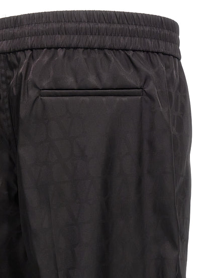 Casual Pants by Valentino Garavani for men in nylon black, patterned & toile features an sophisticated and with a precise long, creating a sophisticated and sophisticated silhouette.