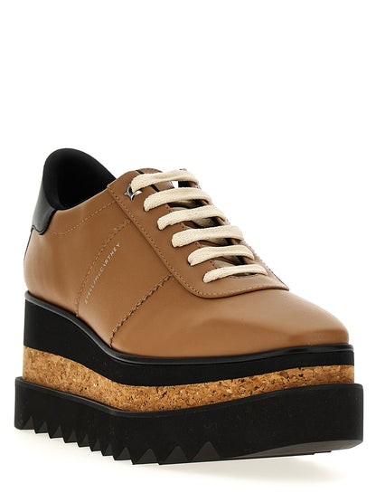 Wedge Lace-Up Sandals by Stella McCartney for women in polyester & polyurethane brown features an effortlessly chic silhouette from the Women's Polyester & Polyurethane Wedge Lace-Up Sandals collection, showcasing a effortlessly chic wedge and elegant .