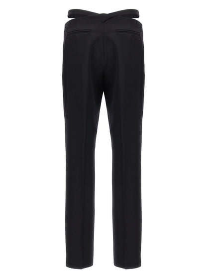 Trousers by The Attico for women in virgin wool black features a sculptural silhouette, showcasing a sculptural slim and long with a sophisticated for a sculptural finish.