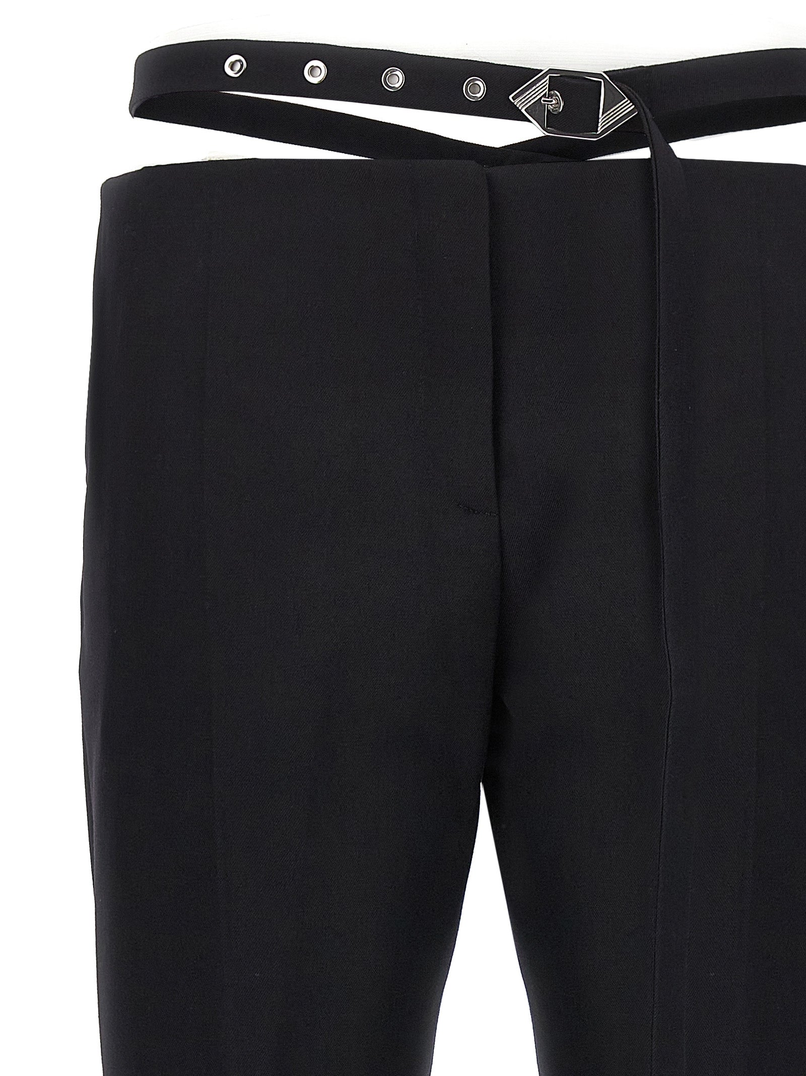 Trousers by The Attico for women in virgin wool black features a artisanal silhouette, showcasing a sophisticated slim with a long and for a artisanal finish.