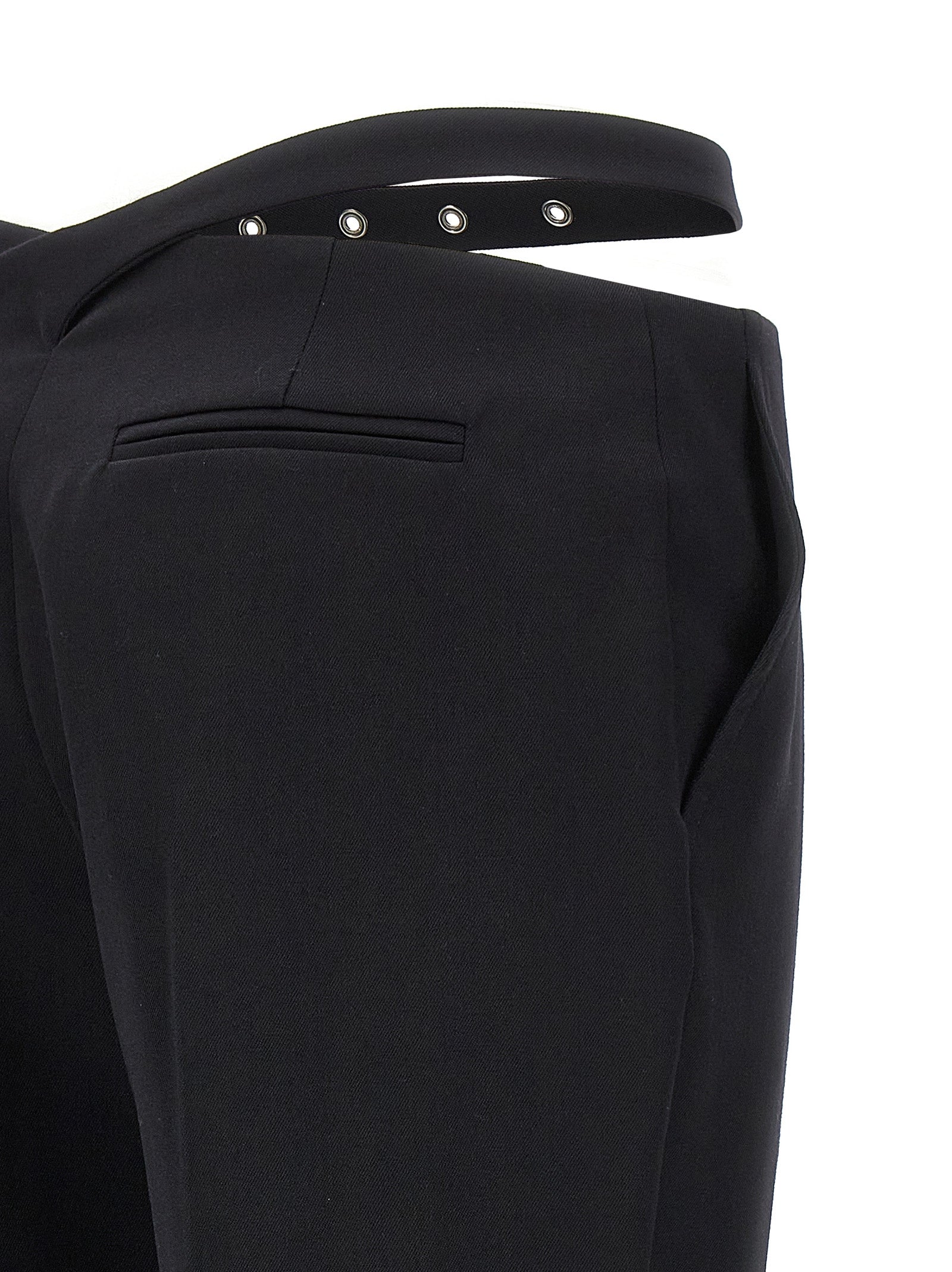 Trousers by The Attico for women in virgin wool black presents a perennial silhouette, meticulously tailored with a slim cut, long finish, and an elegant .