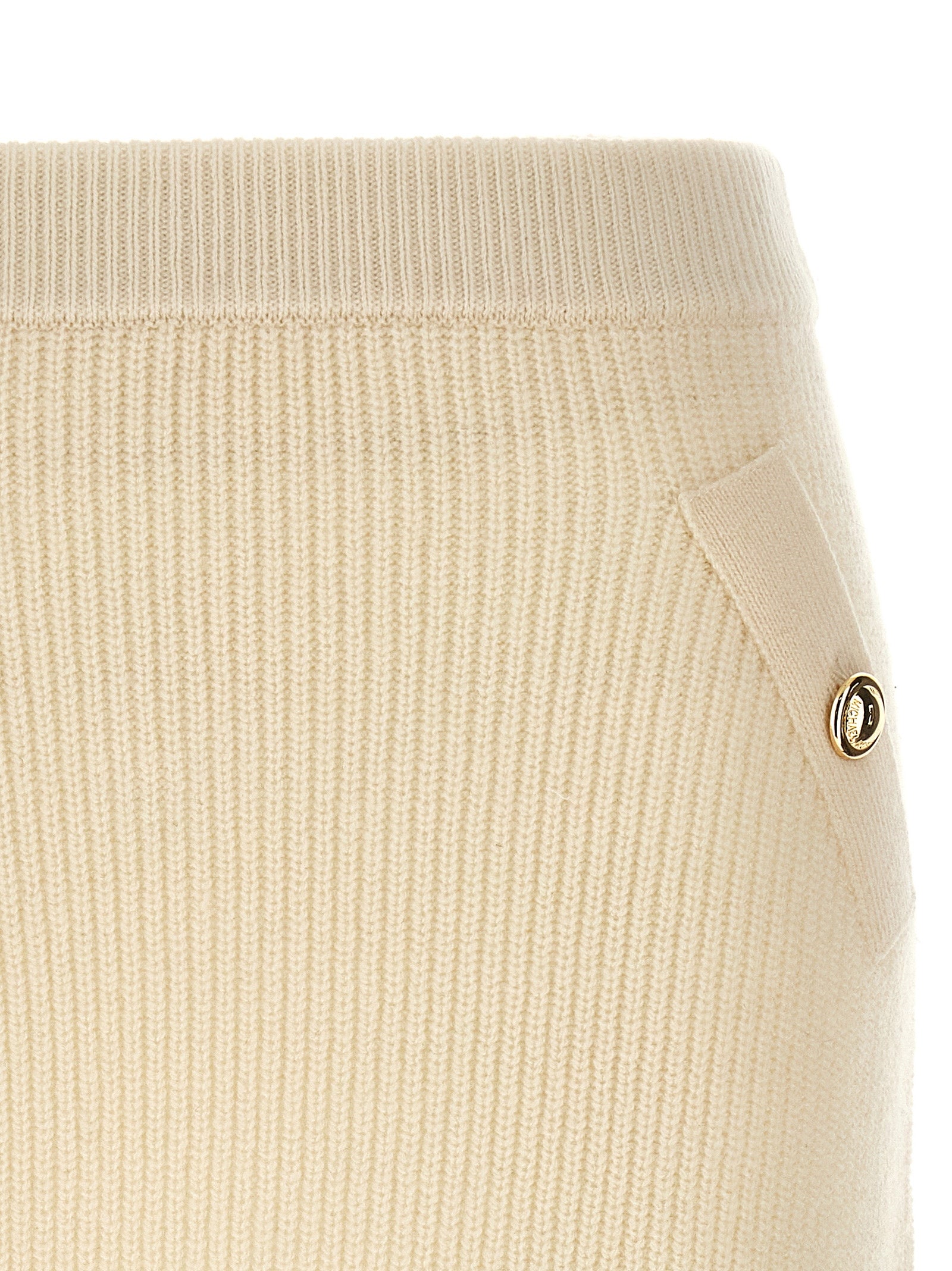Skirt by Michael Kors for women in cashmere wool & nylon white showcases a sultry silhouette, elegantly defined by its long and the sophisticated sultry design of the Women's Cashmere Wool & Nylon Long Skirt.