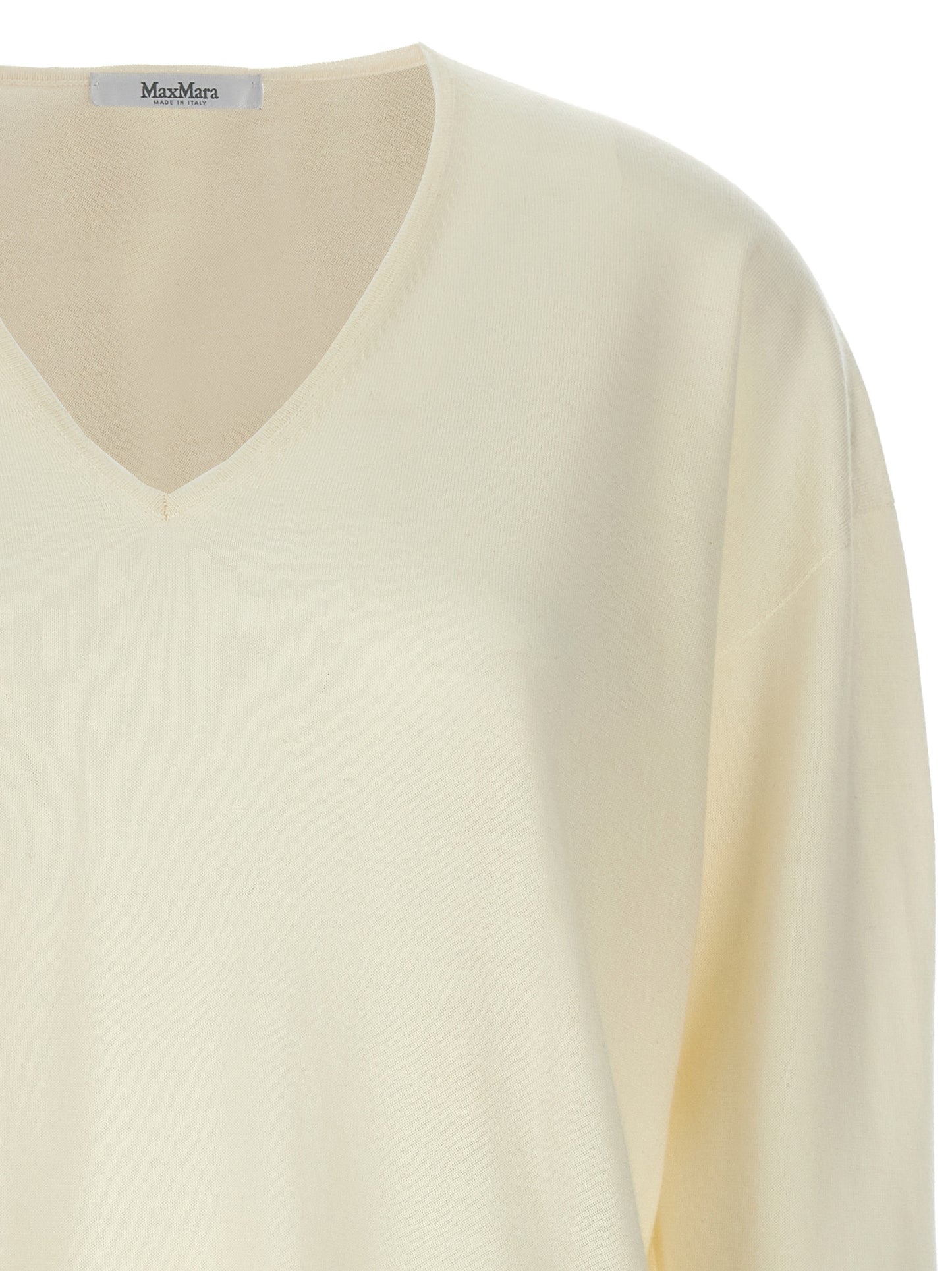 Cardigan by Max Mara for women in cashmere white showcases a luxurious silhouette, meticulously detailed with a sophisticated v-neck neckline and for a refined finish.