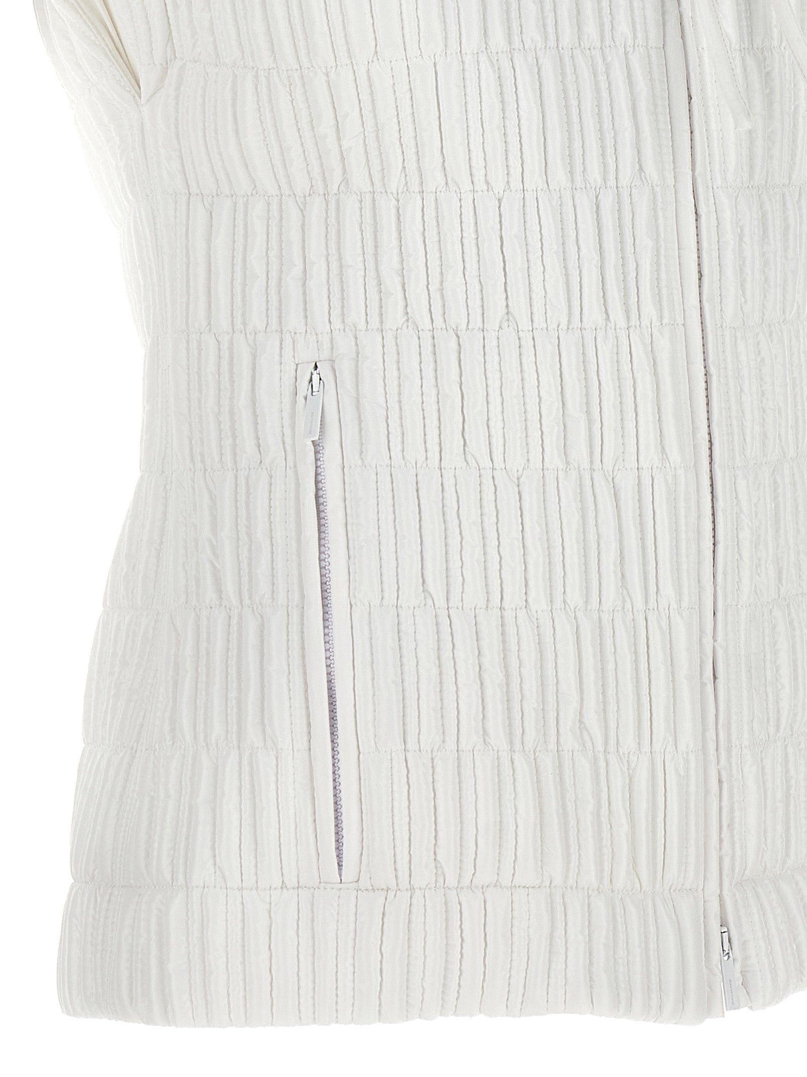 Hooded Vest by Ferragamo for women in polyamide white showcases a utilitarian silhouette, artfully incorporating pockets, hooded & insulated and a utilitarian for a truly utilitarian finish.