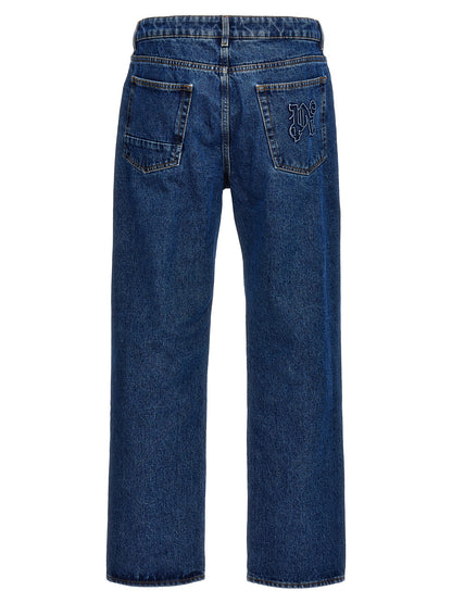 Jeans by Palm Angels for men in denim cotton blue & monogram features an sartorial straight-leg and long with a cut for a sartorial finish.