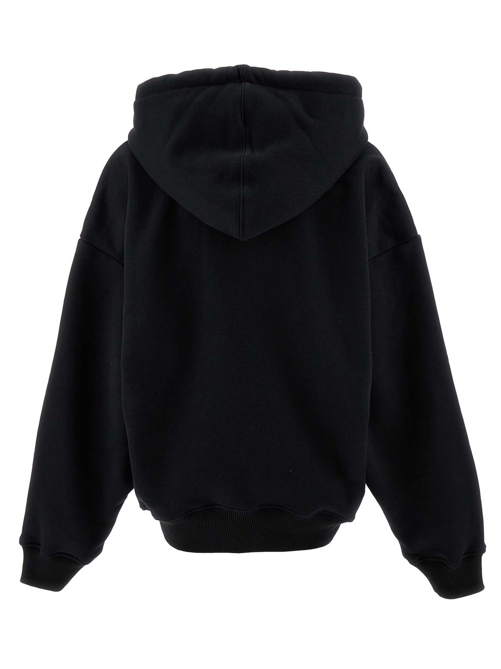 Sweatshirt Hoodie by Off-White for women in cotton black, white & signature features a slouchy chic silhouette, detailed with a slouchy chic and a signature hooded neckline for an elevated aesthetic.