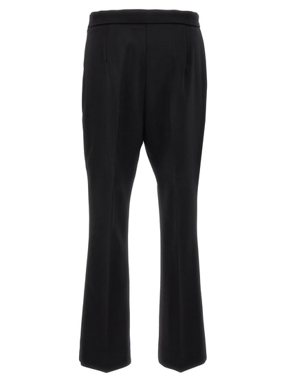 Trousers by Max Mara for women in virgin wool black features a tailored silhouette with a tailored cropped, defined by its cropped and a sophisticated .