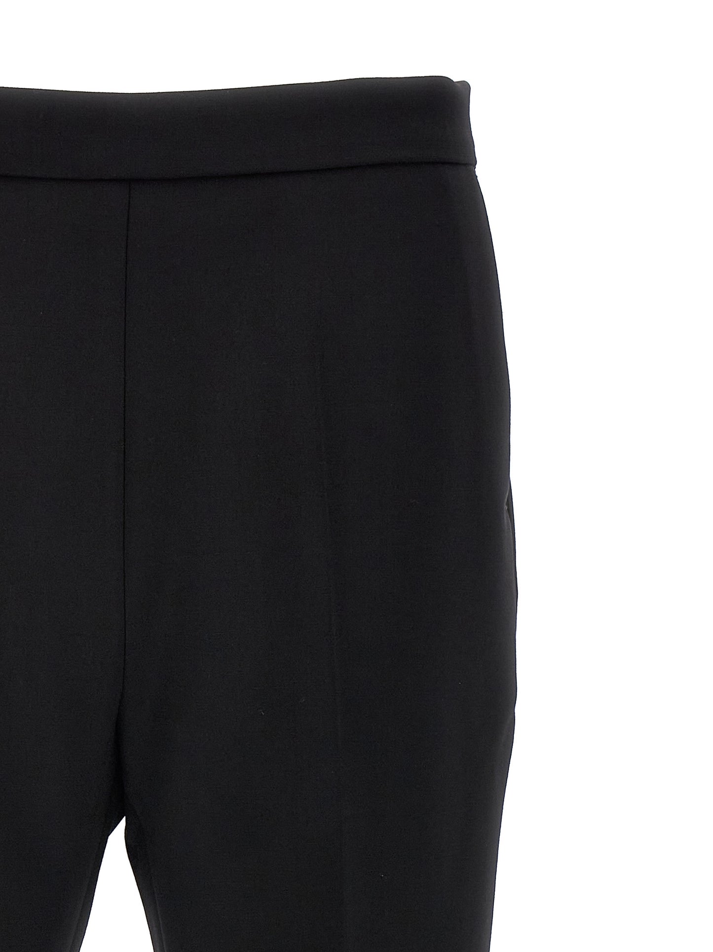 Trousers by Max Mara for women in virgin wool black presents a smart silhouette, meticulously detailed with a smart cropped, a smart cropped, and a smart .