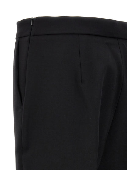 Trousers by Max Mara for women in virgin wool black features a sculptural silhouette, showcasing a sculptural cropped and cropped with a sophisticated for a sculptural finish.