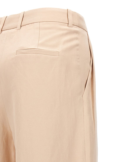 Trousers by Loulou De Saison for women in linen & cotton multicolor & pink features an sartorial silhouette, showcasing a precise wide and long with a sartorial for a refined look.
