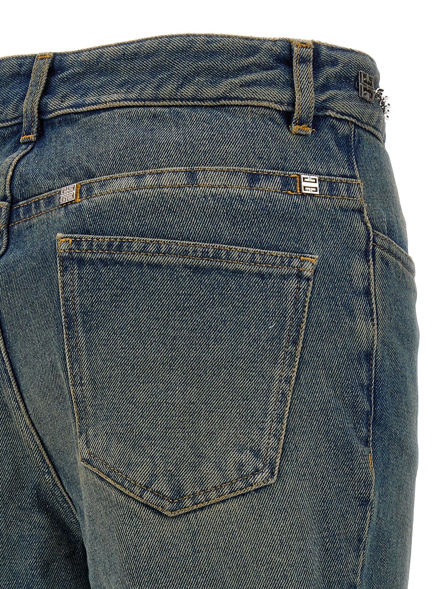 Jeans by Givenchy for women in denim cotton blue features an sartorial bootcut and long with a cut for a sartorial finish.