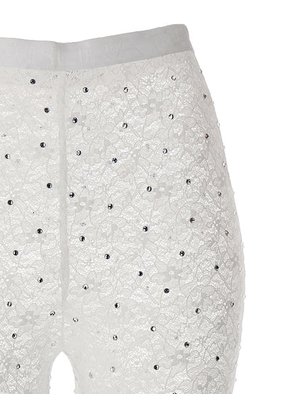 Activewear Leggings by Alessandra Rich for women in stretch polyamide & rhinestones white features an streamlined leggings and with a long cut, beautifully enhanced by performance-driven .