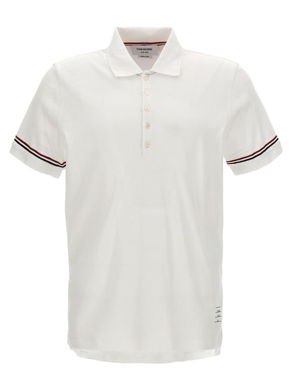 Polo Shirt by Thom Browne for men in cotton white features a eye catching silhouette, showcasing a refined and short-sleeve for a eye catching finish.