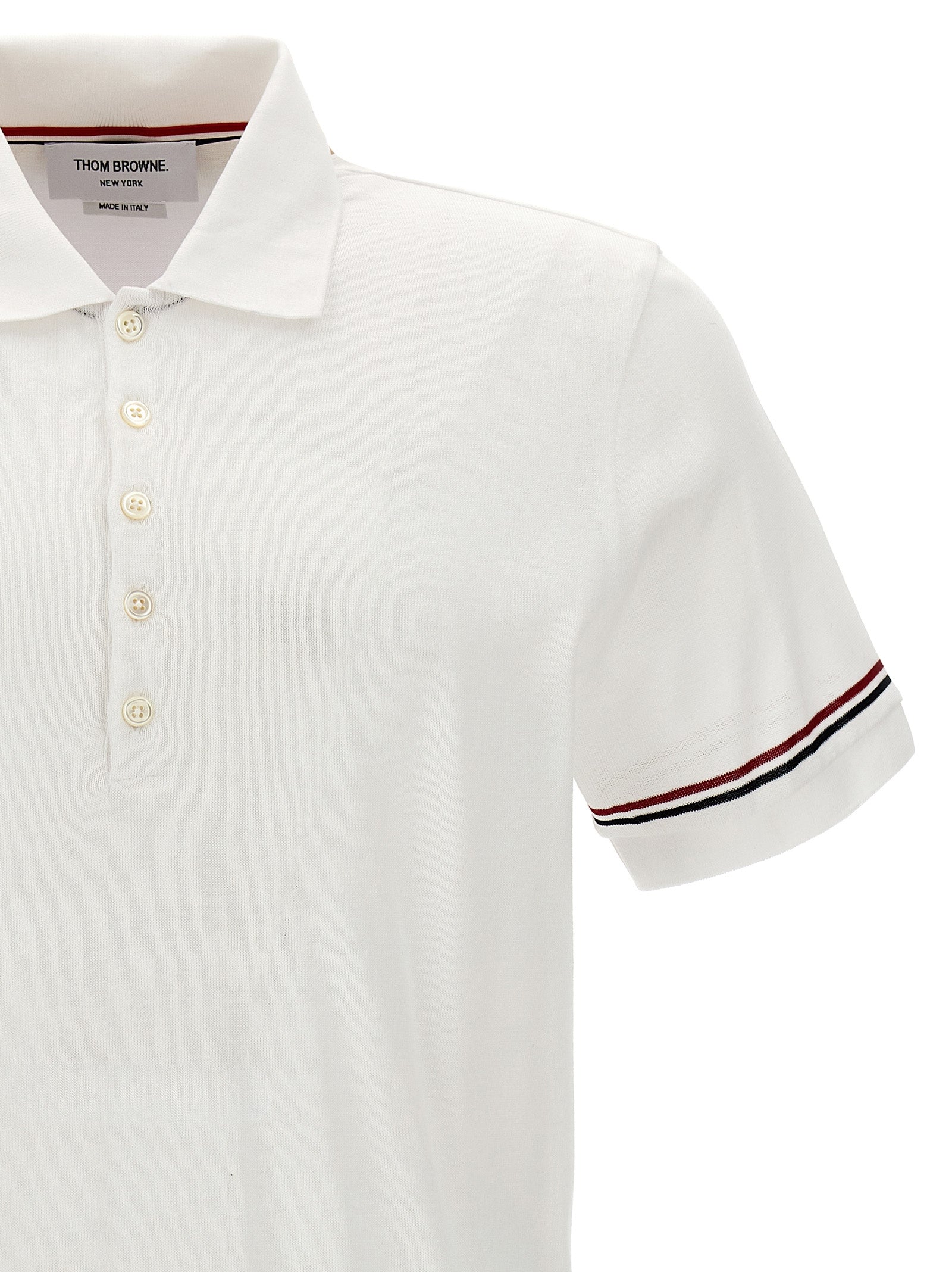 Polo Shirt by Thom Browne for men in cotton white showcases a enviable silhouette, featuring a refined and for a enviable finish.