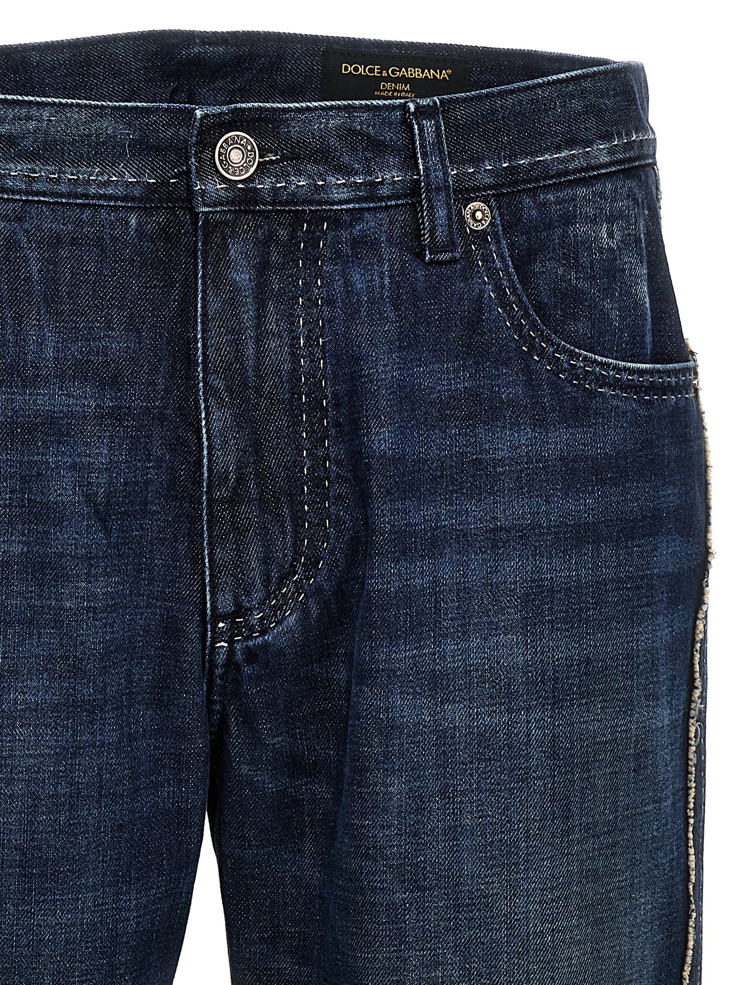 Jeans by Dolce & Gabbana for men in denim cotton blue features an sophisticated and skinny-leg & skinny with a precise long, creating a sophisticated and sophisticated silhouette.