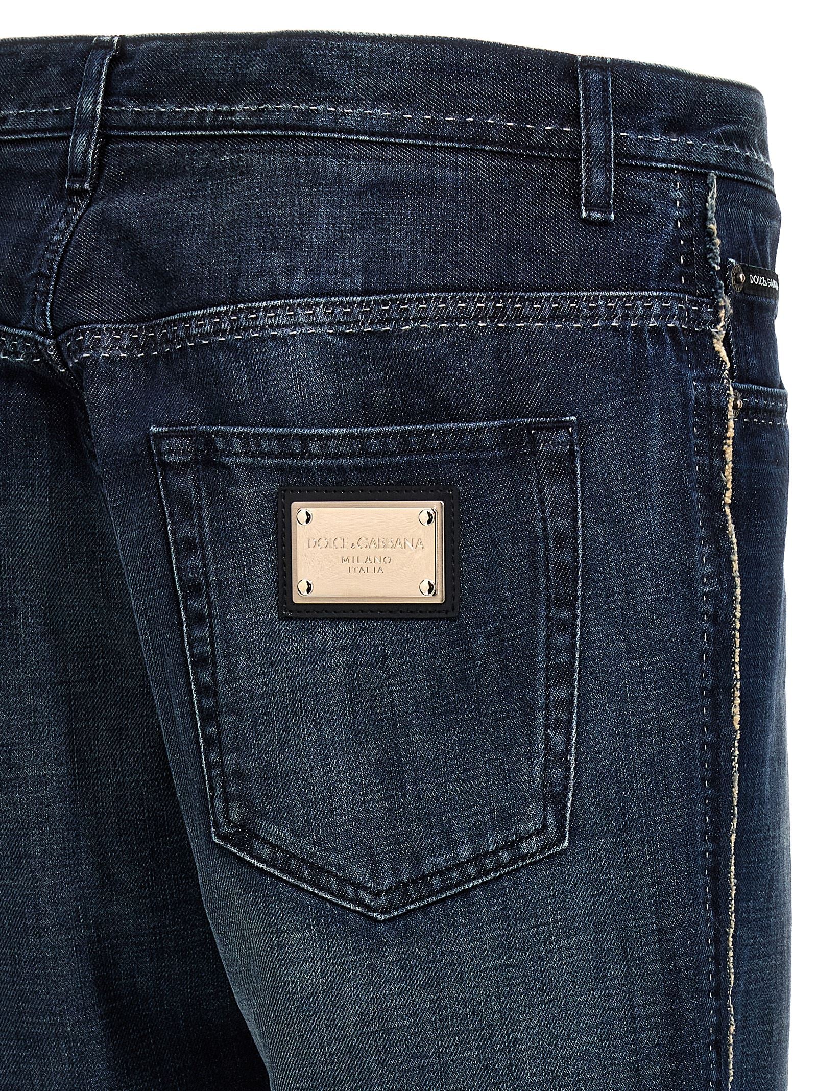 Jeans by Dolce & Gabbana for men in denim cotton blue features an sartorial skinny-leg & skinny and long with a cut for a sartorial finish.